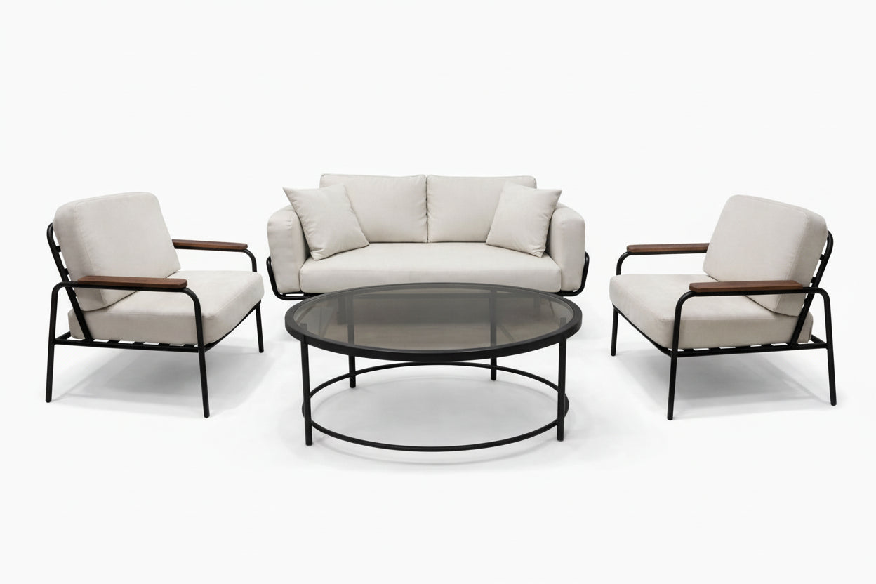 Outdoor furniture set with a sofa, two chairs, and a round table on a white background