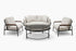 Outdoor furniture set with a sofa, two chairs, and a round table on a white background